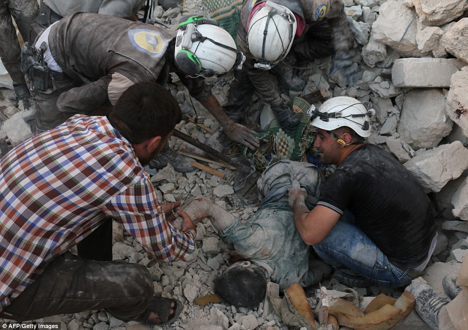 3398932200000578-3562398-The_White_Helmets_have_been_braving_the_continued_bombing_in_an_-a-45_1461854099846