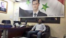 القبض على مقيم سوري رفع صورة بشار داخل مكتبه بالرياض
