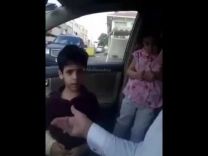 مقطع طريف لطفل يحاول ان يرقع الوضع امام والدهـ