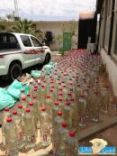 بالصور : القوة الخاصة لأمن الطرق بمنطقة حائل  تقبض على عشريني  بعد أن لاذا بالفرار#بحوزته مئات القوارير من الخمور وقطع حشيش