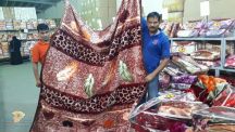 جمعية حائل الخيرية تقوم بتوزيع الكسوة الشتوية