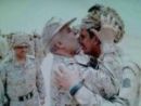 (صورة) ضابط يقبل جبين جندي مصاب# بتمارين “سيف عبدالله”;